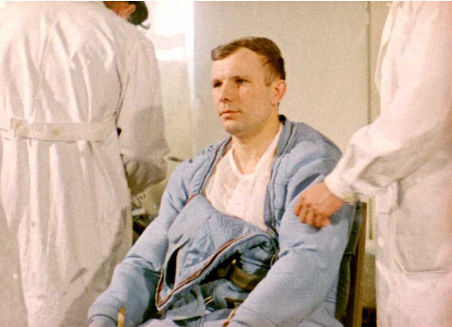 Gagarin is helped in suiting up
