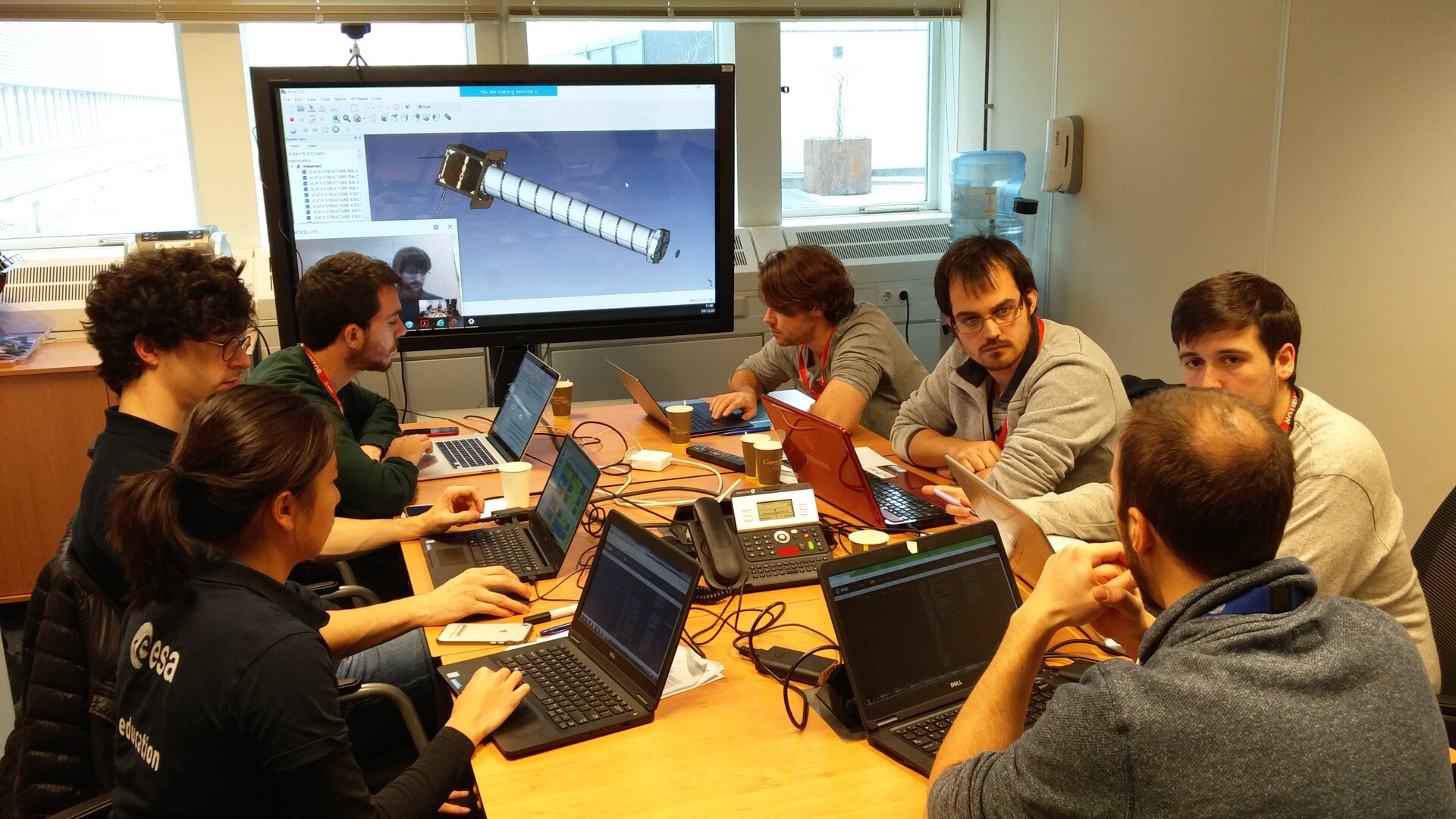 CubeSat team discussing the CubeSat design with an ESA specialist