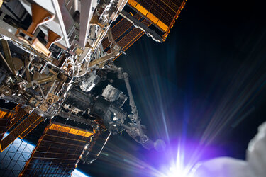 Sun beams during a spacewalk