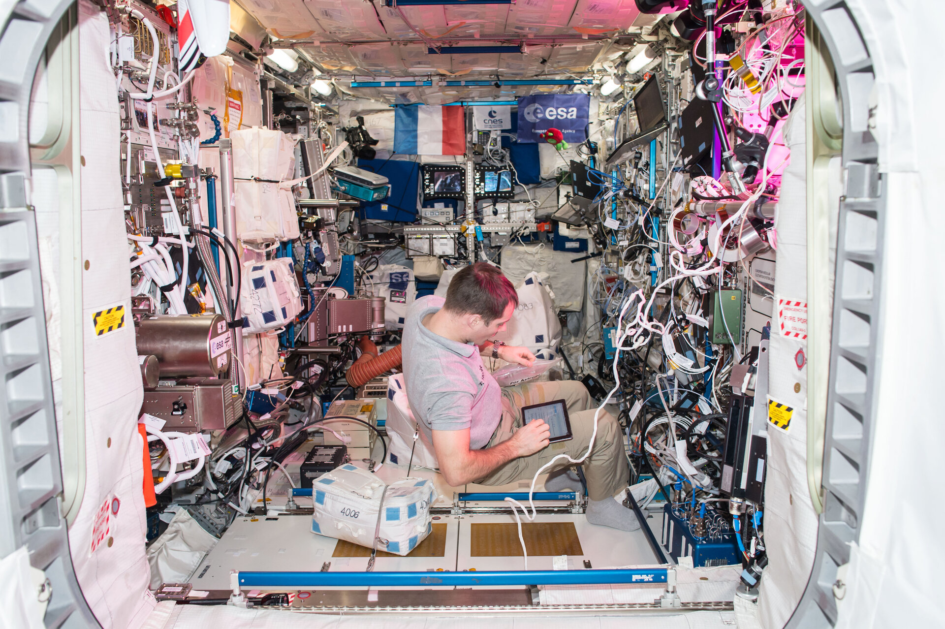 Thomas Pesquet works in the European Columbus laboratory in space