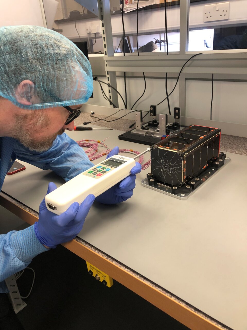 Measuring the spring force of the EIRSAT-1 satellite