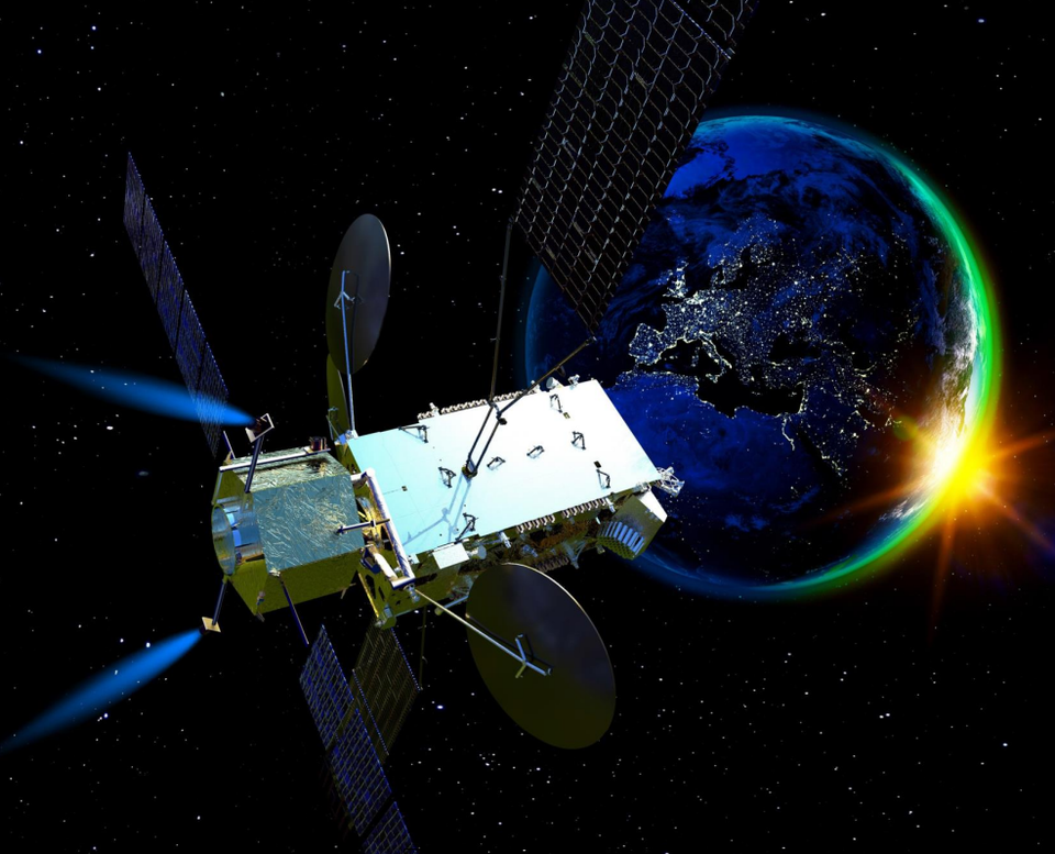 Telespazio’s START- € servicing spacecraft (gold, left) attached to a satellite (white, right) orbiting Earth