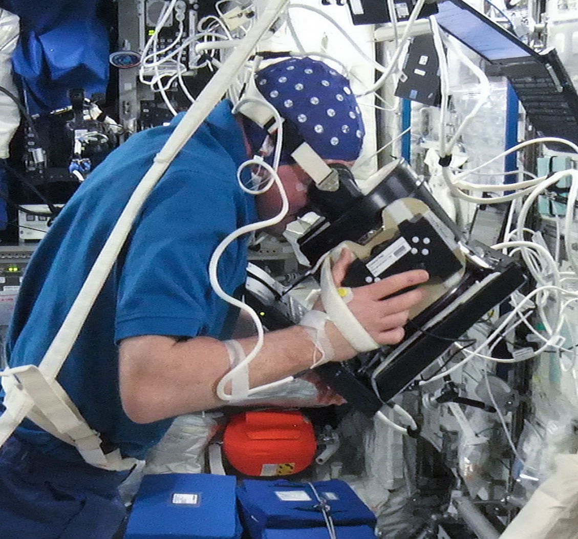 ESA astronaut with a EEG net during Neurospat experiment