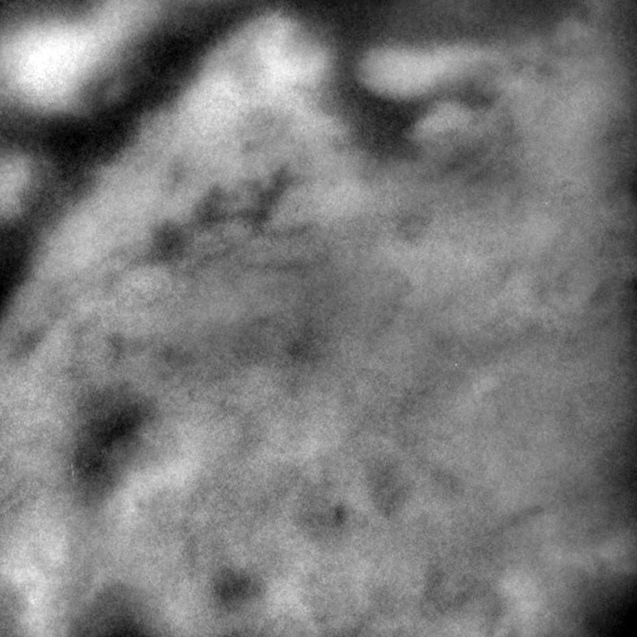 ESA - Methane clouds and surface features now visible on Titan