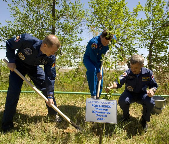 The Soyuz TMA-15 crew take part in the traditional tree-planting ceremony ahead of their launch to the ISS