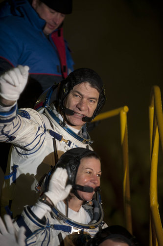 Crew greeting audience at the launch pad