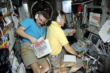 Paolo Nespoli and Alexander Kaleri prepare for the final phase of ATV docking