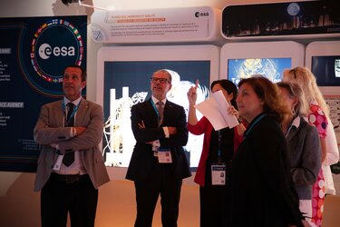 ESA Director General Josef Aschbacher photographed during his visit of ESA's exhibition inside the Space Pavilion.  