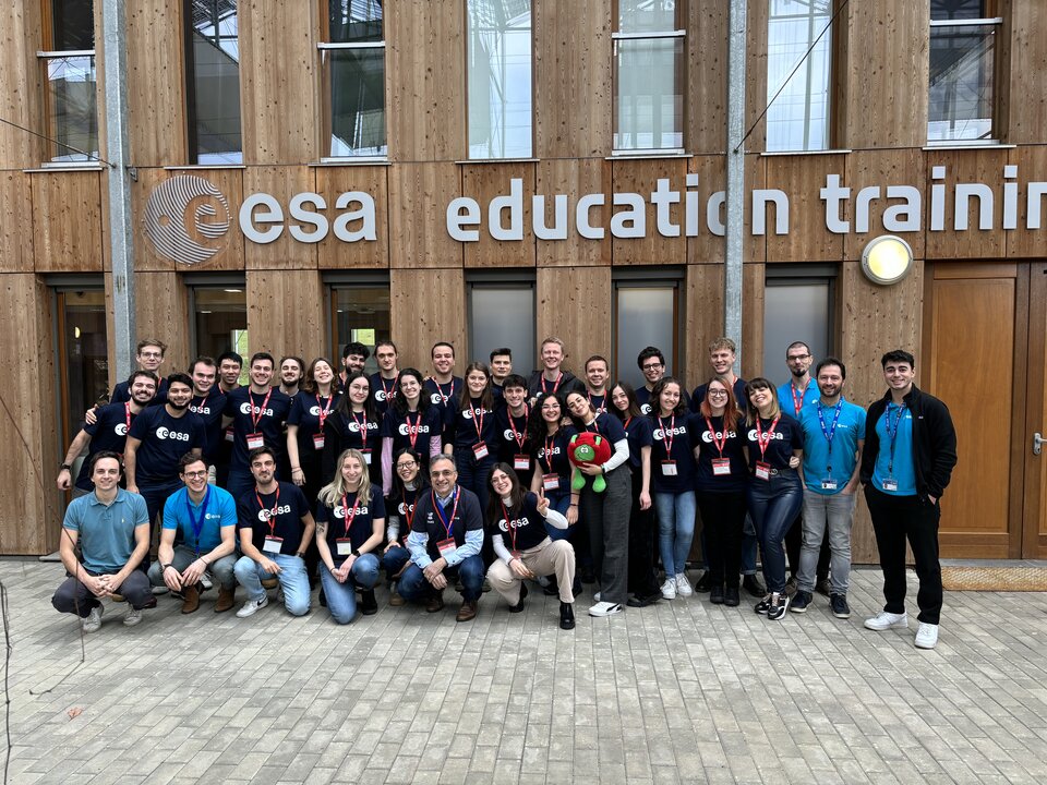 Final picture of students and trainers participating in the CubeSat Concurrent Engineering Workshop