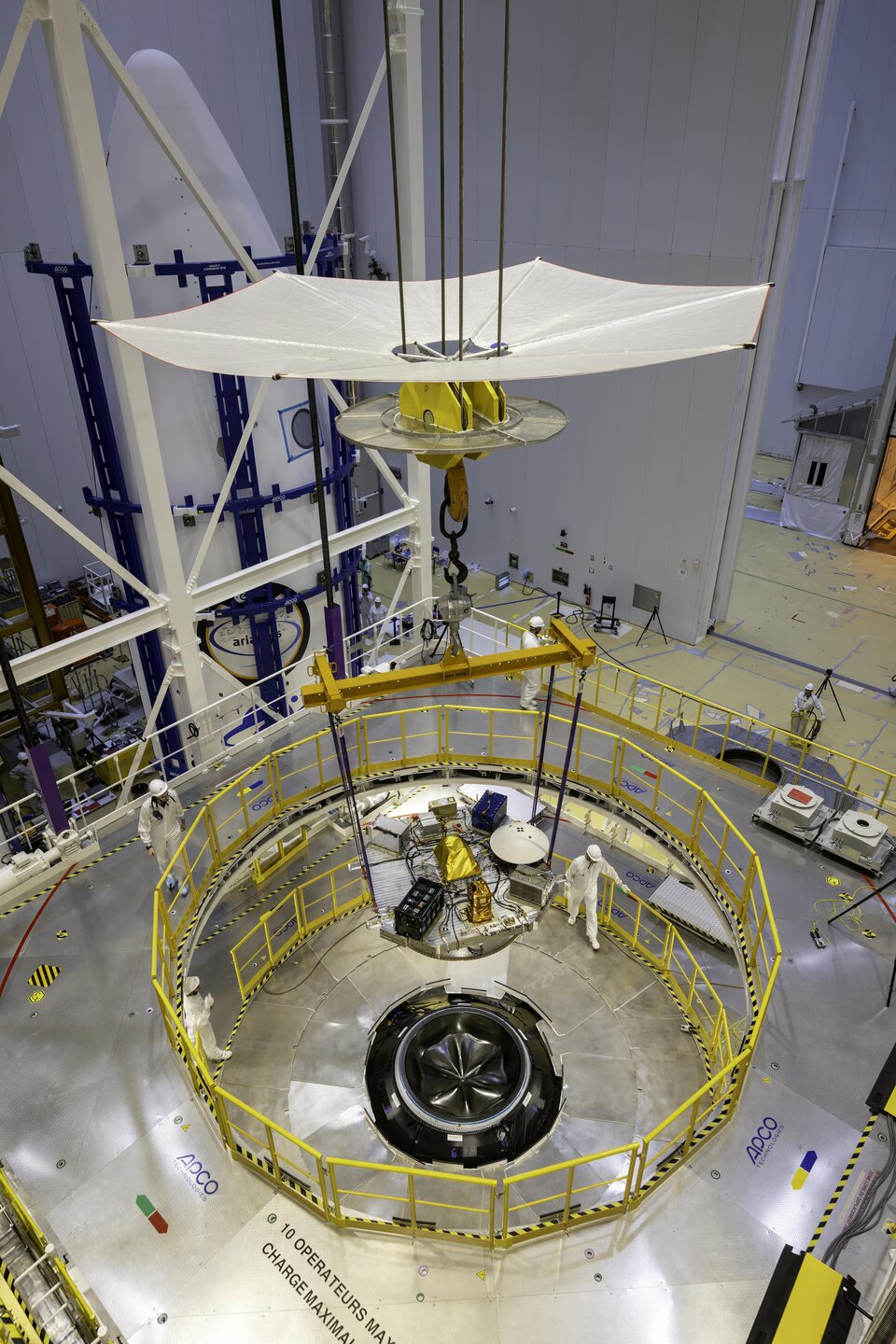 Technicians prepare the payloads and ballast for the first flight of Ariane 6 