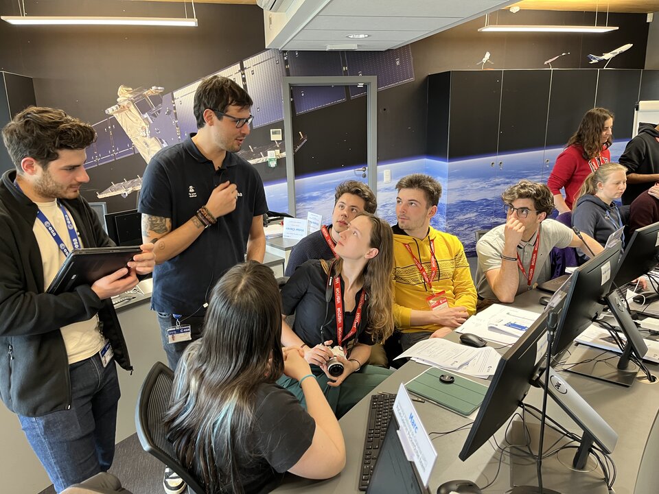 Students in discussion with ESA Education trainers  